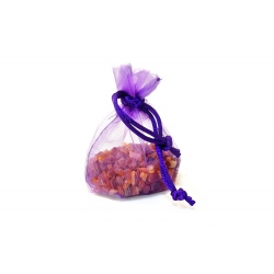 Pépites d'ambre dans un petit sachet violet